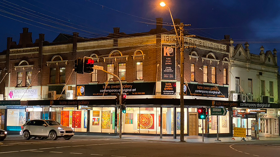 Outside Kate Owen Gallery at dusk: The artworks are illuminating from the gallery windows