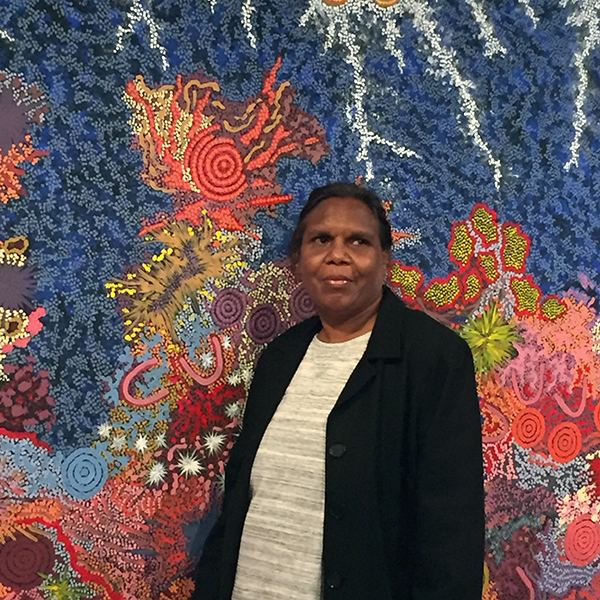 Gabriella Possum with one of her artworks