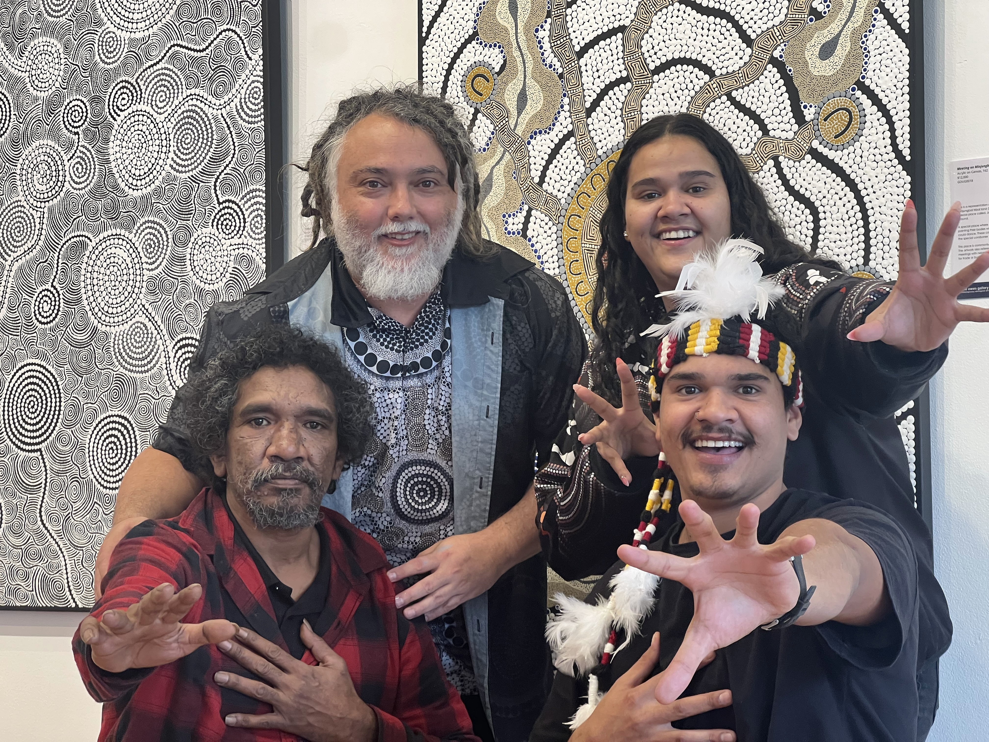Independent artist Goompi Ugerabah with his family at his exhibition opening at Kate Owen Gallery