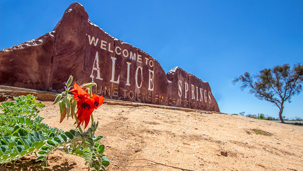 the iconic 'welcome' sign as you enter town