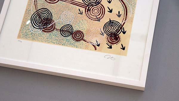 A framed Aboriginal Print