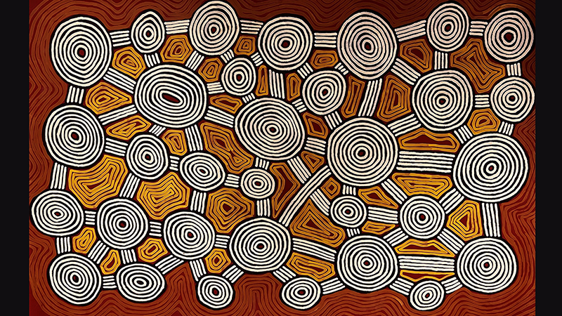 a paitning using traditional designs in an ochre colour scheme