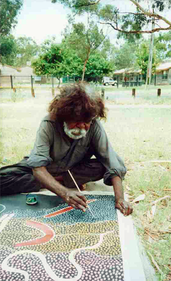 Aboriginal Artist Clifford Possum Painting with Brush